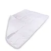 A white quilted blanket is shown on a white background. Náhled obrázku produktu