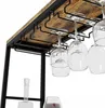 Close-up of a wine rack with glasses hanging from it. Podgląd zdjęcia produktu