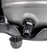 Close-up of a threaded fitting on a gray tank, with a black cap nearby. Náhled obrázku produktu