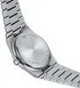 The back of a Tissot watch with its metal band. Voir les images du produit