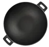 A top-down view of a black cast iron wok grill pan. Podgląd zdjęcia produktu