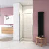 A modern bathroom with a shower enclosure, sink, and radiator. Produktbild-Vorschau
