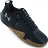 A black Under Armour sports shoe with a brown sole, shown from a slightly elevated side angle against a white background. Anteprima dell’immagine prodotto