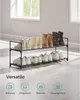 A two-tier shoe rack with shoes on it, with icons and text below indicating versatility. Náhľad obrázku produktu