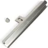 A metal grill part and a bolt on a white background. Voir les images du produit