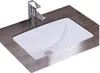 A white rectangular sink with a chrome faucet is set into a dark wood-grain countertop. Náhled obrázku produktu