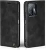 A black flip case for a smartphone is shown from two angles, open and closed. Produktbild-Vorschau