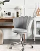 A gray velvet office chair with a shell-shaped back is placed in a home office setting. Náhled obrázku produktu