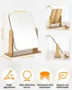 A product image featuring a wooden tabletop mirror with dimensions and feature callouts, along with smaller inset images showcasing different angles and details of the mirror. Produktbild-Vorschau