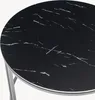 A close-up view of a round black marble-patterned tabletop with silver trim and legs. Produktbild-Vorschau