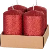 Four red glitter candles in a cardboard box. Náhled obrázku produktu