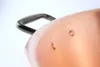 A close-up shot of a copper pot with a black handle. Produktbild-Vorschau