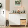 A hallway or entryway with a white sideboard decorated for winter. Produktbild-Vorschau