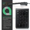 A product image showing a black USB numpad with various text and diagrams highlighting its features and dimensions. Voir les images du produit