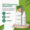 A product shot of hair serum with its packaging, surrounded by green leaves and text describing its benefits and ingredients. Produktbild-Vorschau