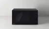 A black Panasonic microwave oven is shown on a white surface against a white background. Produktbild-Vorschau