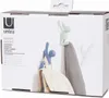 The image shows the packaging for Umbra Buddy Hooks, featuring illustrations of the hooks in use. Náhled obrázku produktu