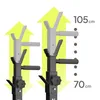 Two adjustable squat stands are shown side-by-side, with arrows indicating height adjustment. Measurements are provided. Náhled obrázku produktu