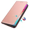 A rose gold flip case for a smartphone is shown from a diagonal angle, with the front cover partially open. Produktbild-Vorschau