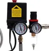 Close-up of an air compressor pressure regulator and filter assembly. Produktbild-Vorschau