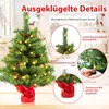 A decorated artificial Christmas tree with lights and pine cones, surrounded by close-up marketing callouts. Anteprima dell’immagine prodotto