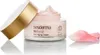 A jar of Sesderma Reti Age Anti-aging Cream with its lid off, next to a pink rose petal, on a white background. Produktbild-Vorschau