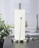 A stainless steel paper towel holder with a roll of paper towels on a kitchen counter. Náhľad obrázku produktu