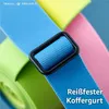 A close-up of colorful luggage straps with a black buckle. Podgląd zdjęcia produktu