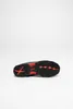 The sole of a shoe is shown against a white background. Voir les images du produit
