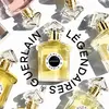 A collage of Guerlain perfume bottles arranged in a circular pattern around a central bottle. Anteprima dell’immagine prodotto