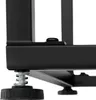 A close-up view of the bottom corner of a black metal furniture piece, showing a spring-loaded adjustable foot. Produktbild-Vorschau