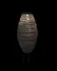 A white, oval-shaped lantern with horizontal ridges, illuminated from within, hangs against a black background. Produktbild-Vorschau