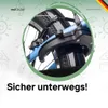 Close-up of a bicycle's brake system and wheel, with a green circular overlay. The background has hand-drawn illustrations of children's drawings. Voir les images du produit