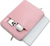 A pink laptop sleeve with a phone and mouse partially inserted into a front pocket. A laptop is also partially visible, emerging from the sleeve. Produktbild-Vorschau