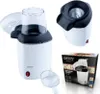A collage of a white and black popcorn maker, its packaging, and a close-up of the top of the popcorn maker. Podgląd zdjęcia produktu