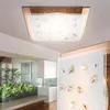 A modern interior with a ceiling light and a decorative glass partition. Náhled obrázku produktu