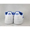 The back view of a pair of white Adidas sneakers with blue accents. Podgląd zdjęcia produktu