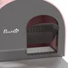 A close-up view of a pink and gray cat litter box with a partially open lid and a built-in scoop. Produktbild-Vorschau