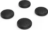 Four black joystick caps for a Nintendo Switch Lite, two with a smooth surface and two with a textured surface, are arranged on a white background. Anteprima dell’immagine prodotto