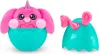 A pink plush toy unicorn bunny emerging from a teal egg-shaped container, with the egg's lid shown separately. Anteprima dell’immagine prodotto