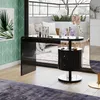 A modern vanity table with makeup and accessories in a well-lit room with a balcony view. Podgląd zdjęcia produktu