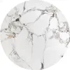 A close-up view of a white marble surface with black and gold veining. Produktbild-Vorschau