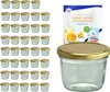 A set of glass jars with golden lids and a recipe booklet. Produktbild-Vorschau