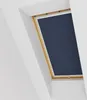 A dark blue blackout blind installed in a wooden-framed skylight. Produktbild-Vorschau