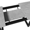 Close-up view of an extendable table's mechanism and surface. Náhľad obrázku produktu