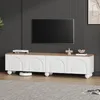 A modern TV stand with a wood top and white cabinet doors, featuring arched paneling and round legs. A robotic vacuum cleaner is visible underneath. Anteprima dell’immagine prodotto