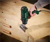 A person is using a cordless drill to attach a metal bracket to a wooden surface. Anteprima dell’immagine prodotto