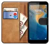 A book-style phone case with a phone inside, a bank card, and euro banknotes. Náhled obrázku produktu
