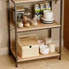 A kitchen shelf with various items including jars, milk cartons, bowls, and a storage box. Podgląd zdjęcia produktu