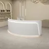 A modern reception desk in a clean, well-lit interior space. Produktbild-Vorschau